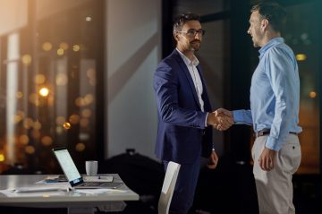 B2b,,Handshake,And,Partnership,With,Business,Men,In,Office,At